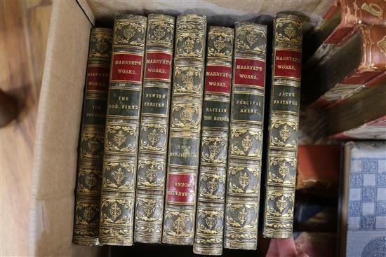 A collection of quarter calf volumes of Kipling and Marryatts Works